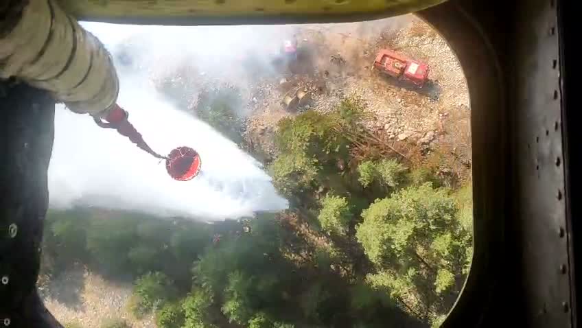 Muğla’da Yılanlı Dağı'ndaki yangına havadan ve karadan müdahale sürüyor
