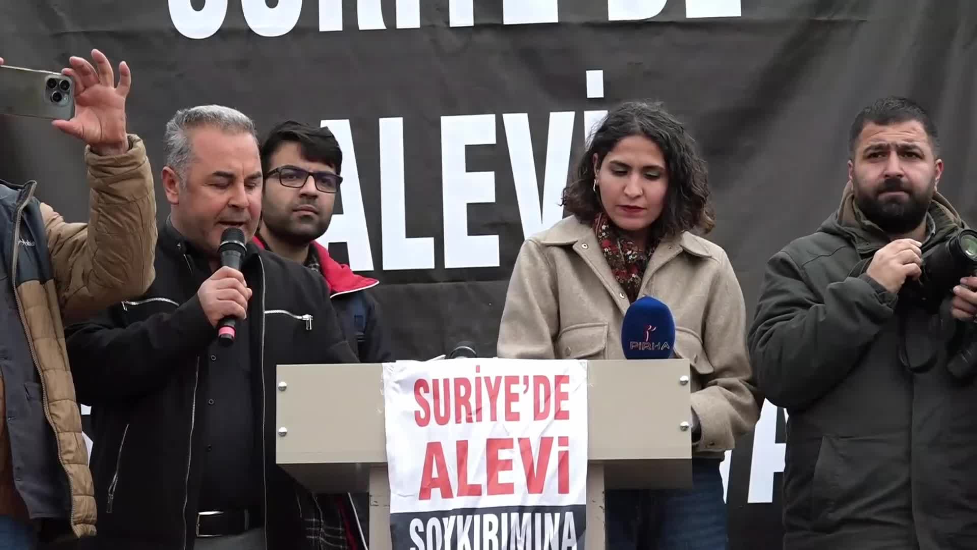 Alevi örgütleri Suriye'deki Alevilere yönelik saldırıları Samandağ'da protesto etti