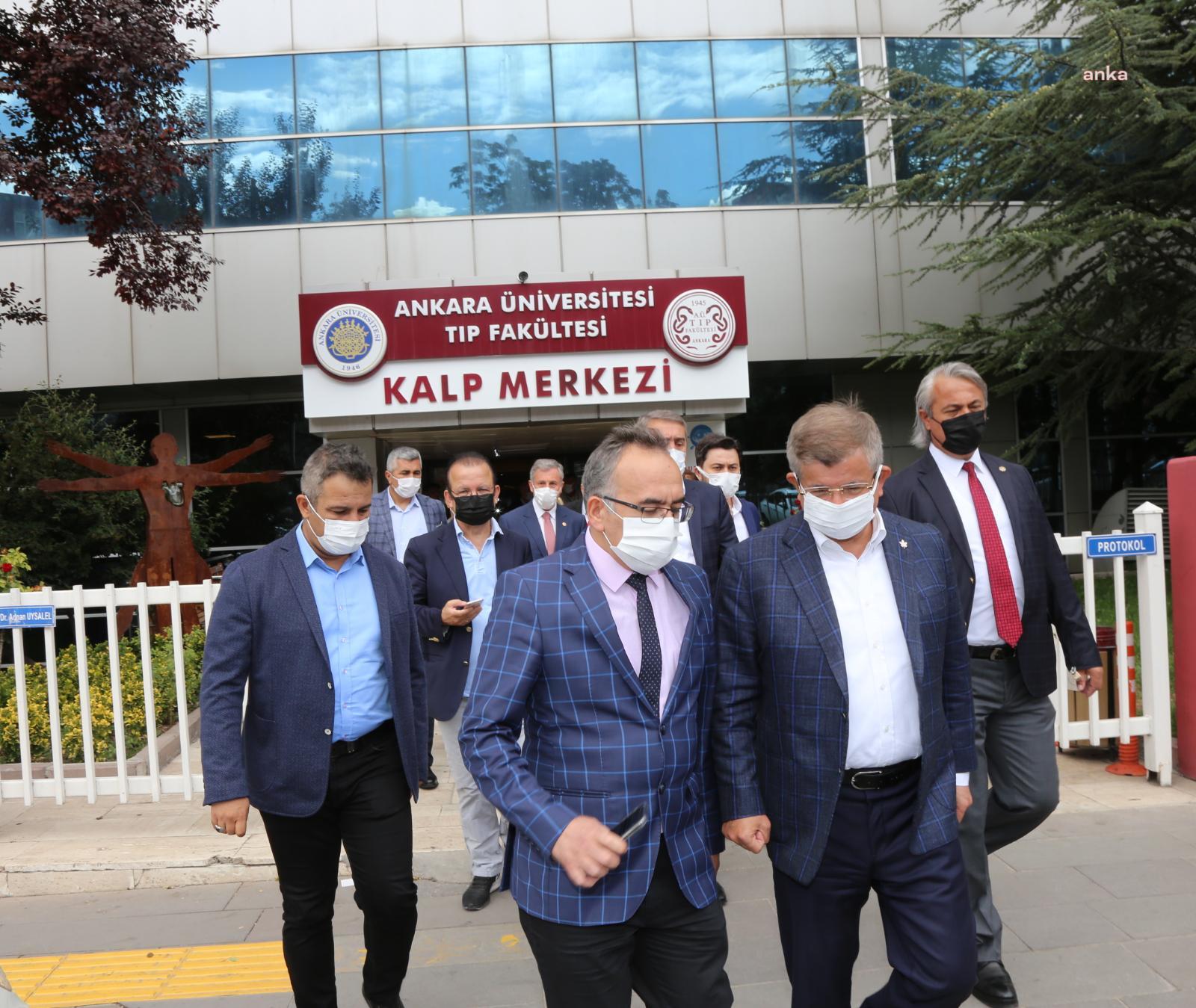 DAVUTOĞLU, ESKİ DÜNYA UYGUR KURULTAYI BAŞKANI ERKİN ALPTEKİN'İ HASTANEDE ZİYARET ETTİ