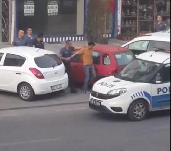 KAYSERİ'DE BALKONUNA İNGİLİZ BAYRAKLI HAVLU ASAN YABANCI ŞAHIS GÖZALTINA ALINDI